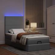 vidaXL Ottomansk säng med madrass och LED-lampor ljusgrå 90x200 cm tyg