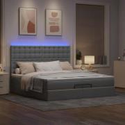 vidaXL Ottoman sängram med madrasser ljusgrå 200x200 cm tyg