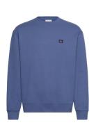 Calvin Klein Jeans Ls 350Terry Eu Whsl Badge Crewne Blå